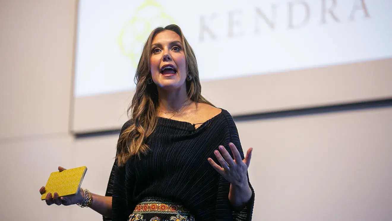 Kendra Scott speaking at an event
