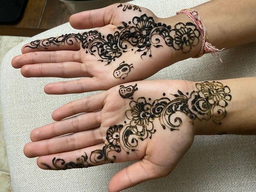 Hands with henna art