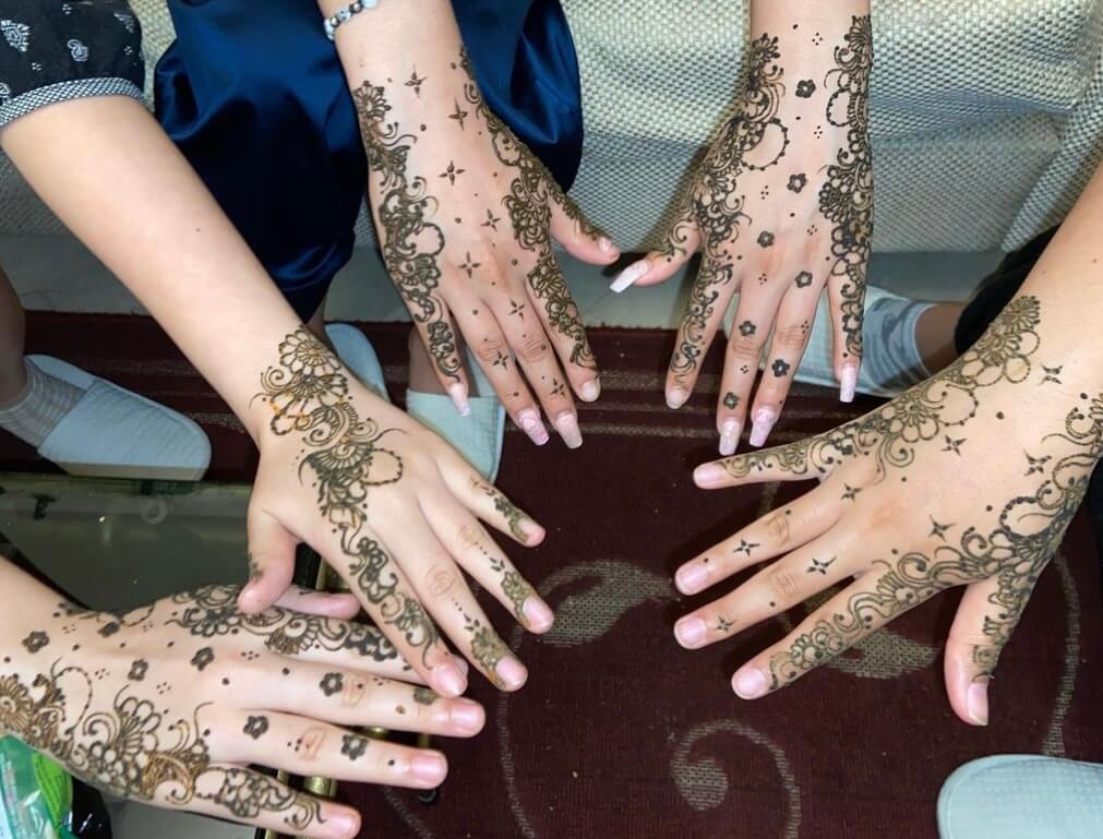 Hands with henna art