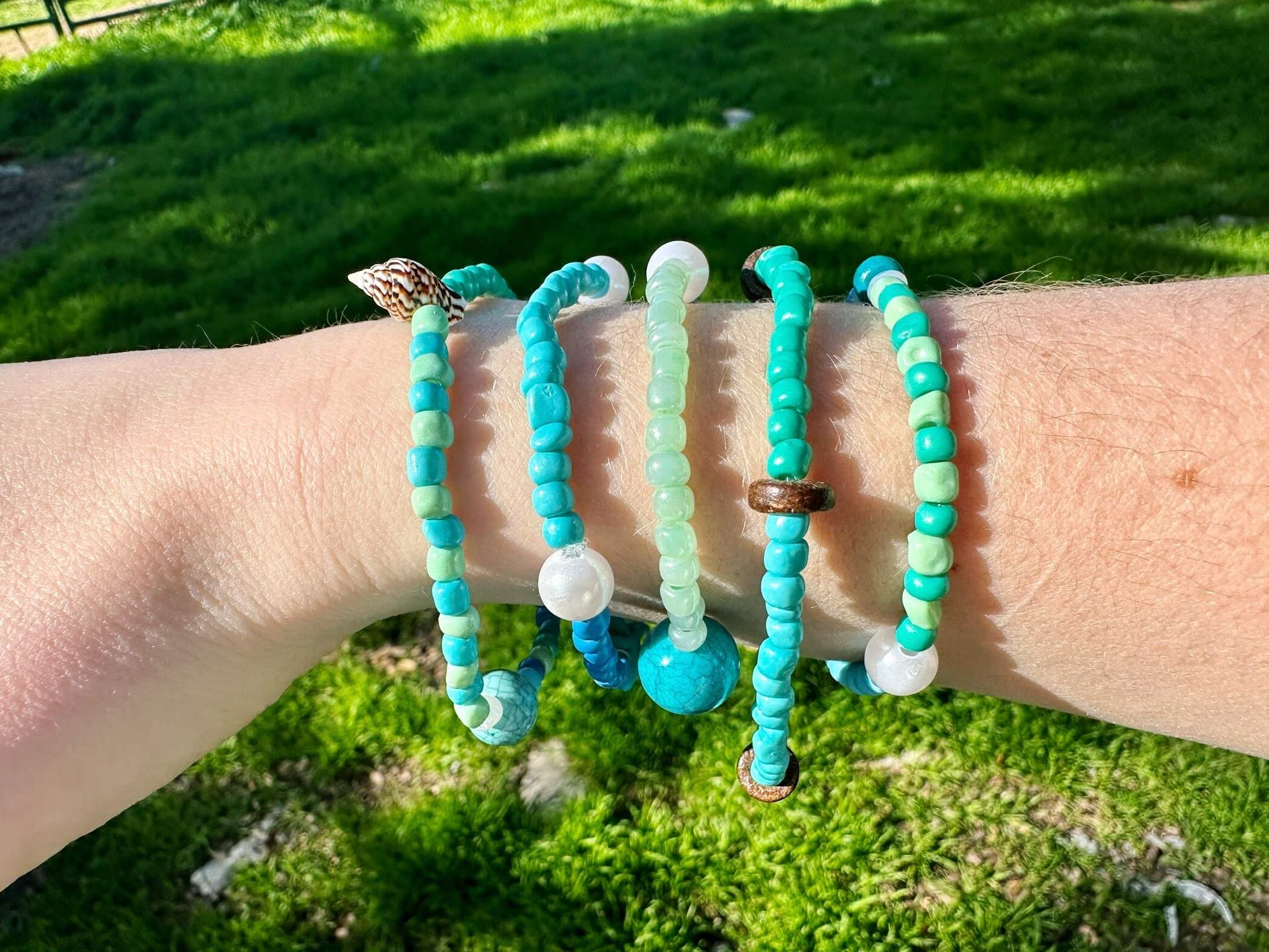 Turquoise bracelets on an outstretched arm